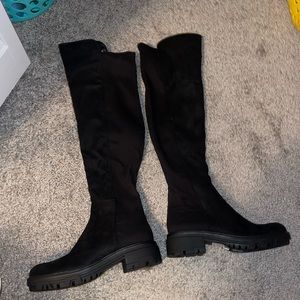 Thigh high black boots